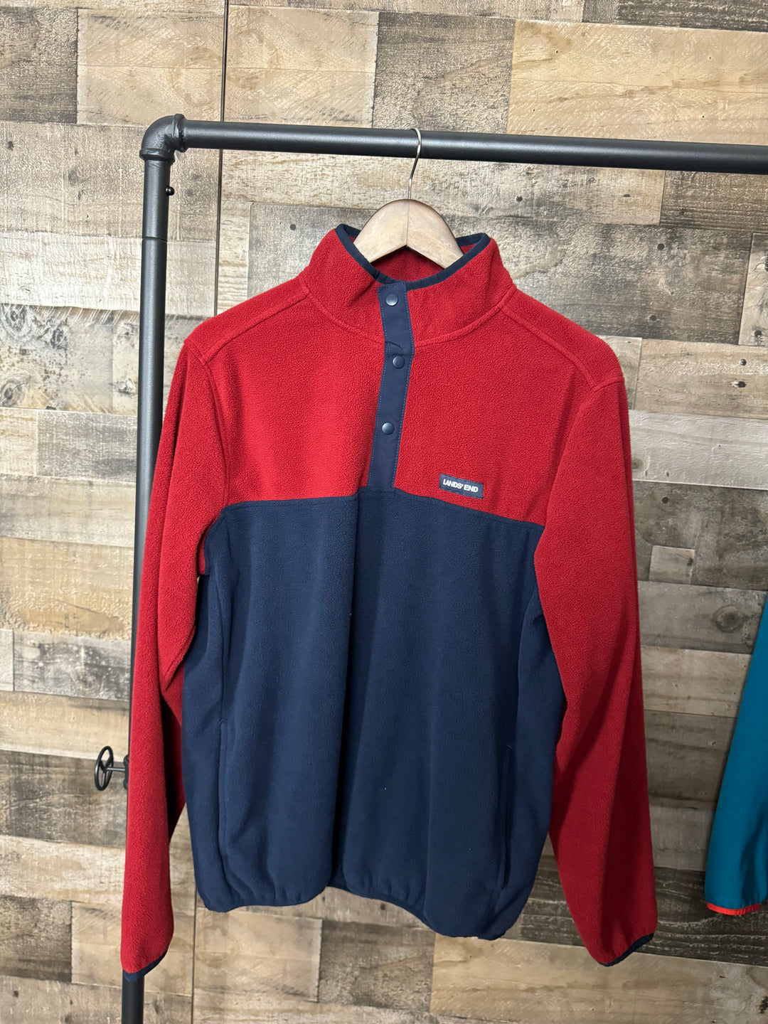 Fuzzy red/navy pull over